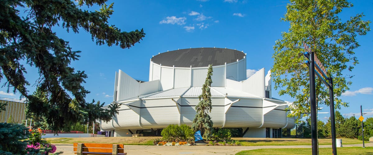 TELUS World of Science-Edmonton which includes a garden and modern architecture