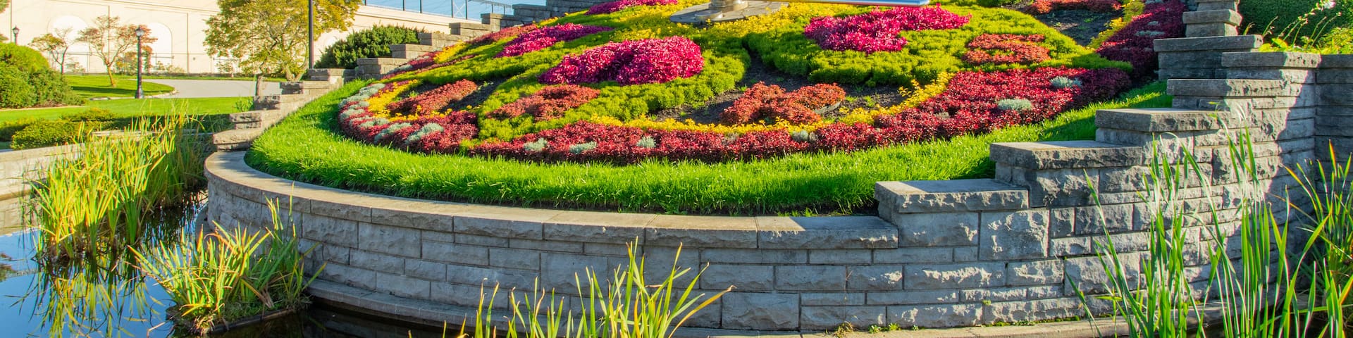 Floral Clock featuring a park, a pond and flowers