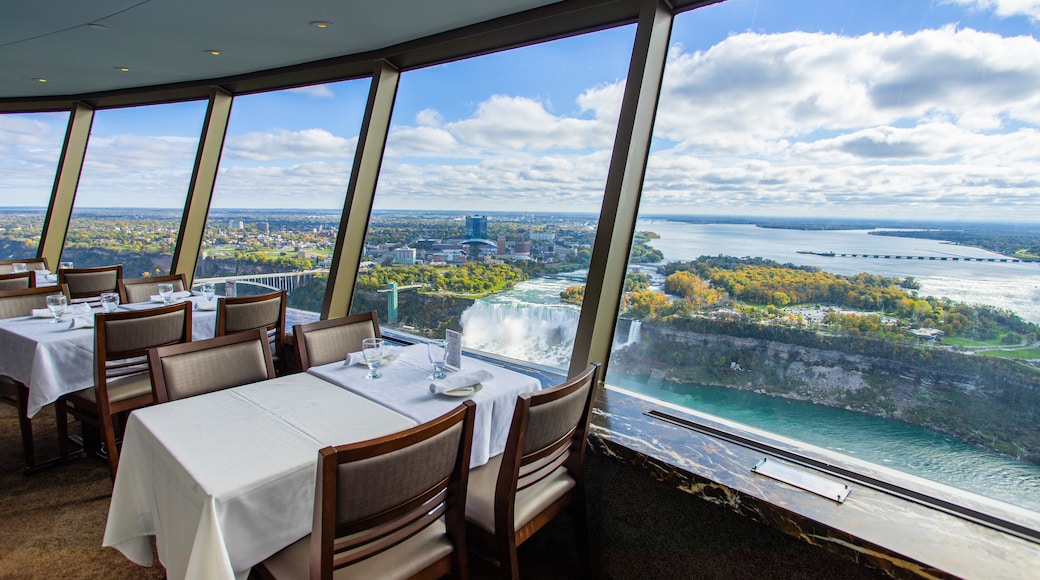 Skylon Tower featuring dining out, views and interior views