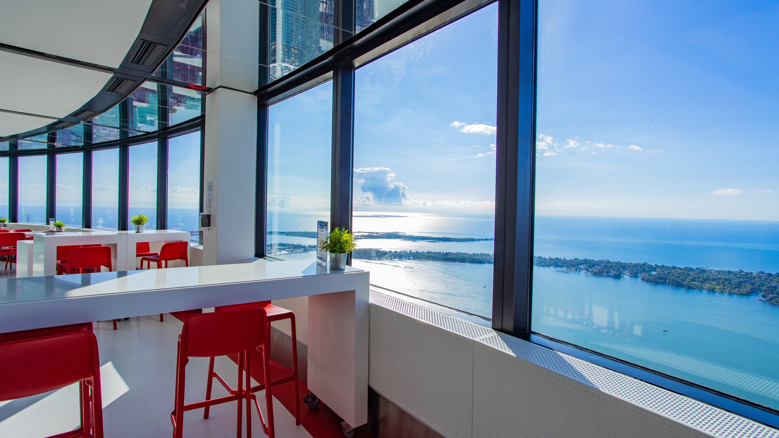 CN Tower featuring a sunset, interior views and views