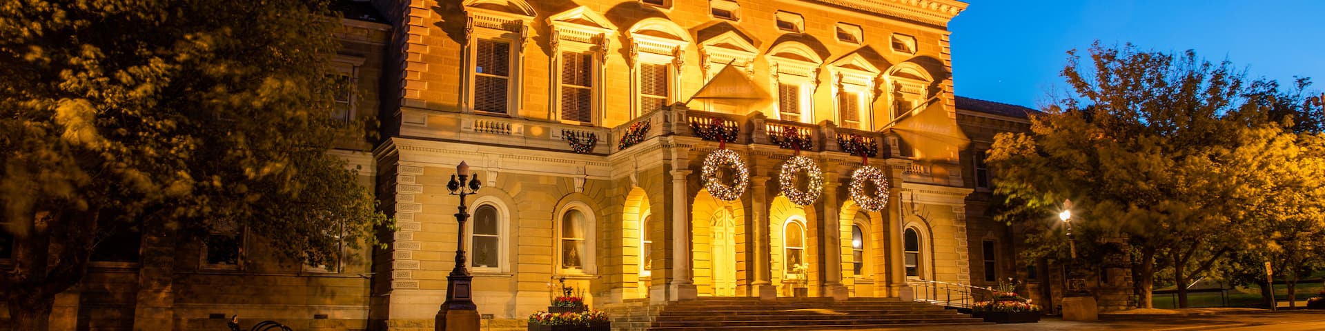 Hobart Town Hall featuring heritage architecture, night scenes and an administrative buidling
