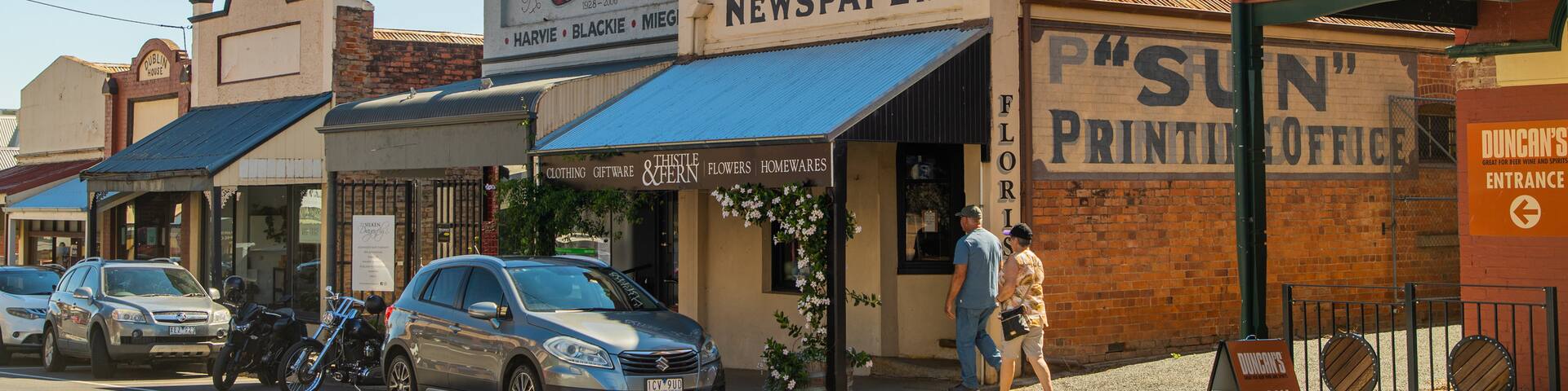 Rutherglen which includes a small town or village and street scenes as well as a couple