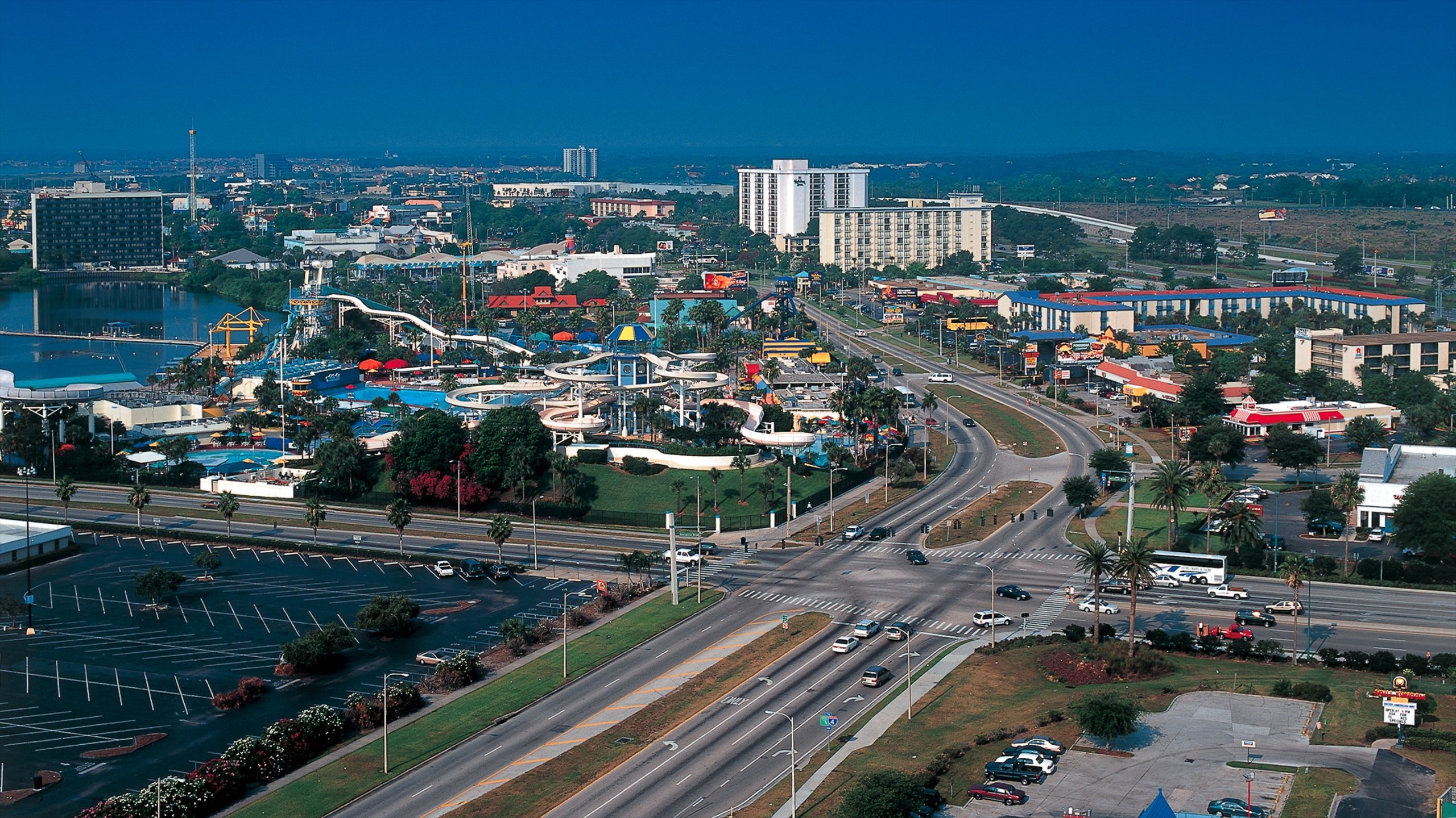 Orlando Premium Outlets International Drive featuring street scenes, rides and a city