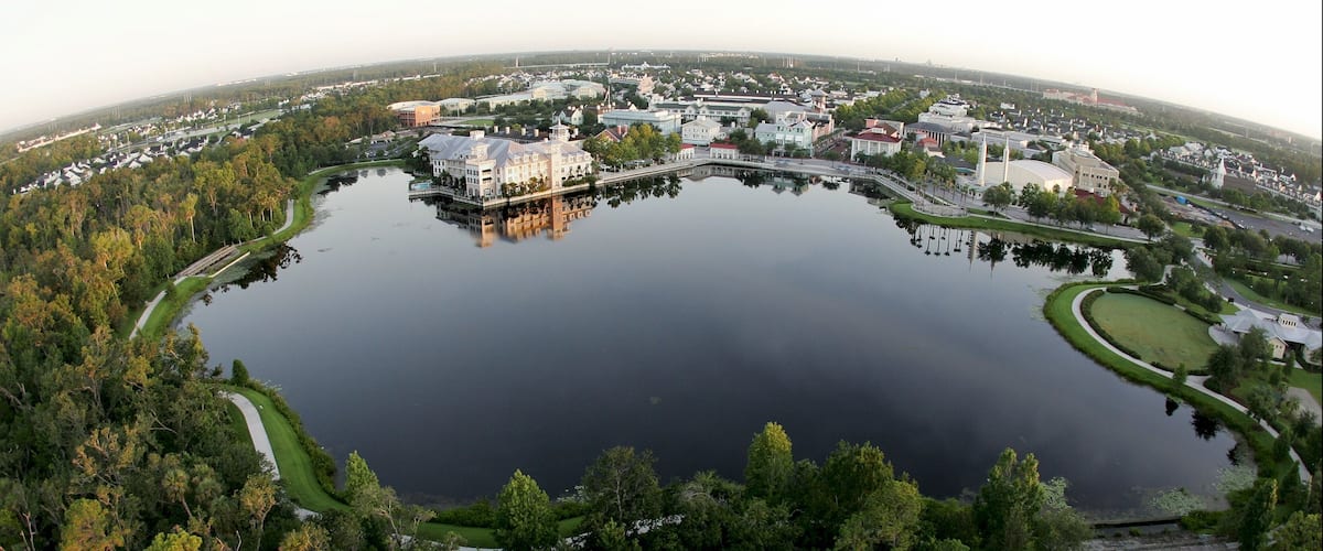 Celebration showing a lake or waterhole, landscape views and a small town or village