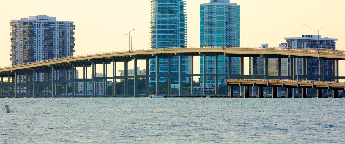 Miami which includes a skyscraper, a bridge and general coastal views