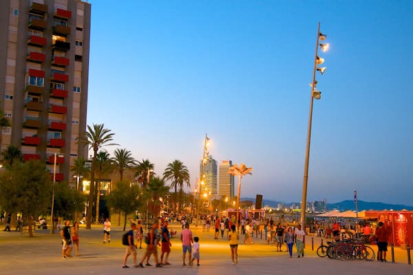 Barceloneta Beach which includes street scenes, a city and night scenes