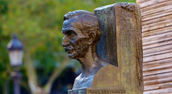 Placa de Catalunya featuring a statue or sculpture and outdoor art