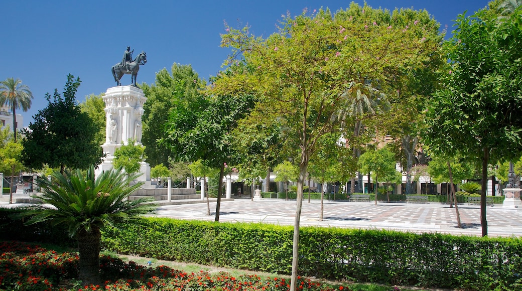 Plaza Nueva ofreciendo un parque o plaza, una estatua o escultura y un monumento