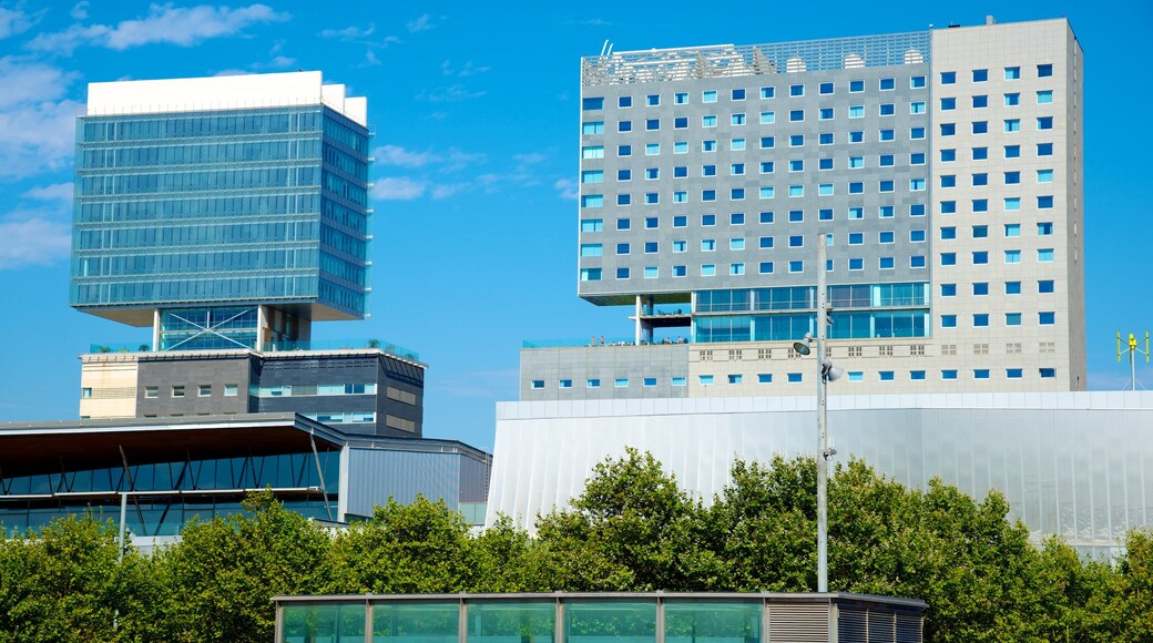 Llevant Beach showing modern architecture and a city