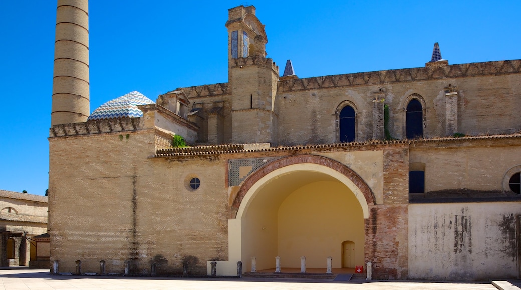 La Cartuja Monastery showing a church or cathedral and heritage architecture