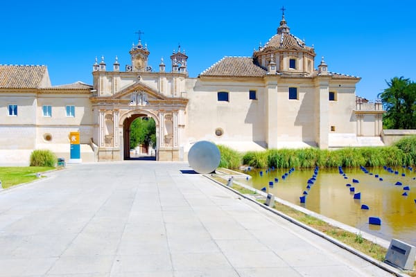 La Cartuja Monastery which includes heritage architecture, a castle and a pond