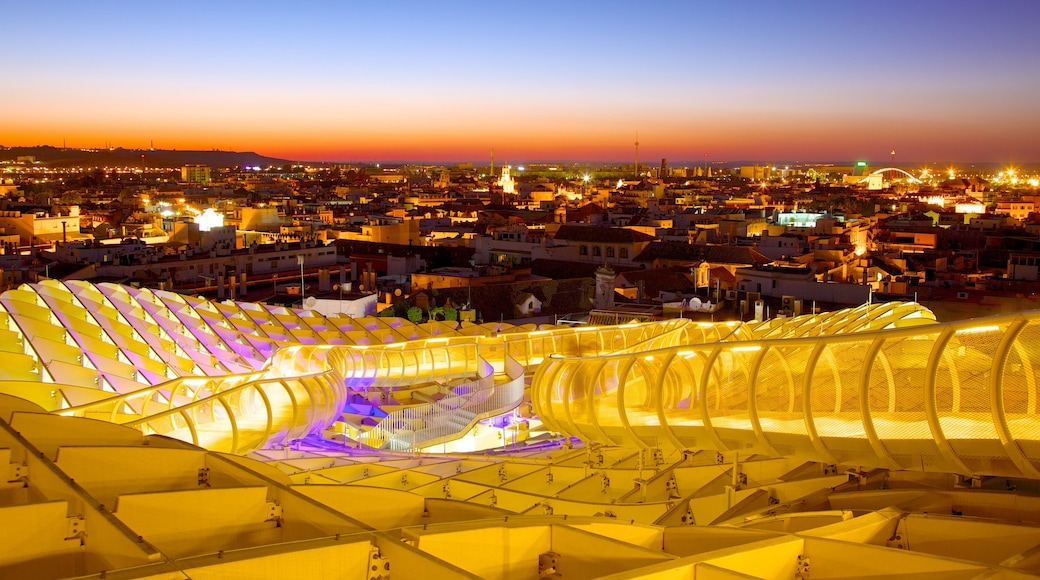 Metropol Parasol showing a city, modern architecture and a sunset