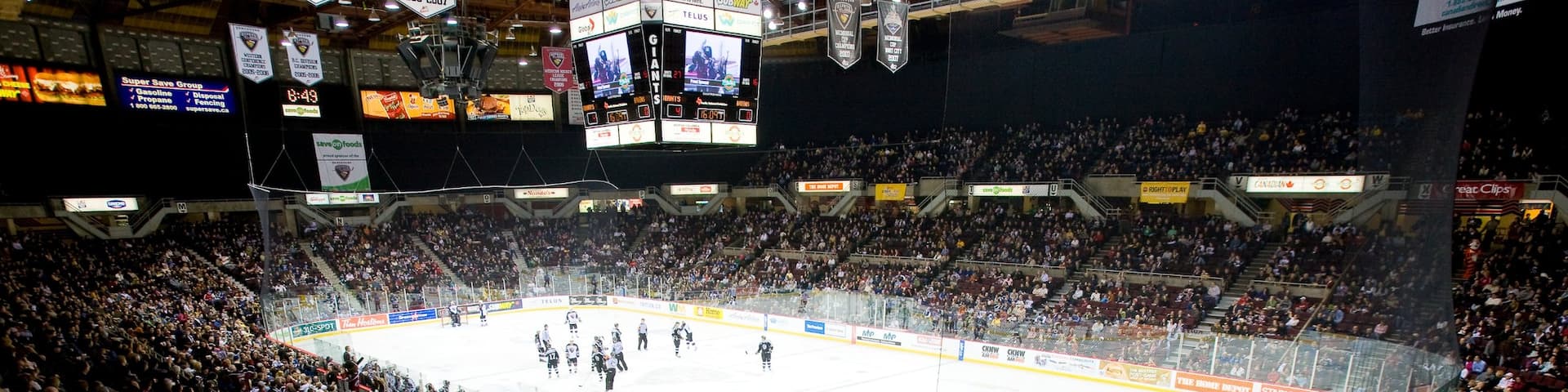 Pacific Coliseum which includes ice skating, interior views and a sporting event