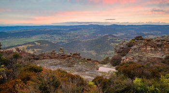 Hassans Wall Lookout featuring a gorge or canyon, tranquil scenes and a sunset