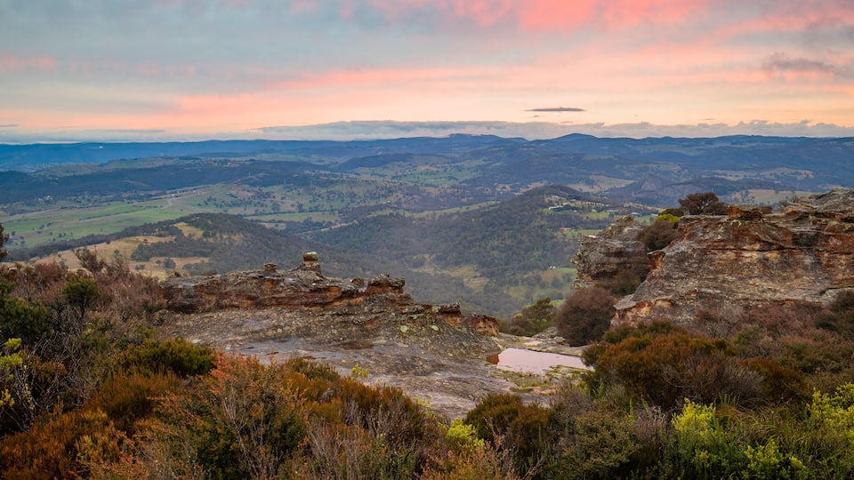 Hassans Wall Lookout featuring a gorge or canyon, tranquil scenes and a sunset