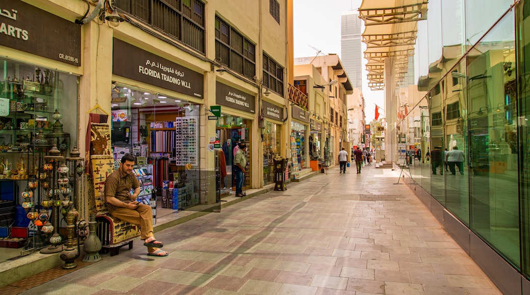 Bab Al Bahrain featuring street scenes as well as an individual male