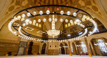 Al Fateh Grand Mosque featuring heritage elements and interior views