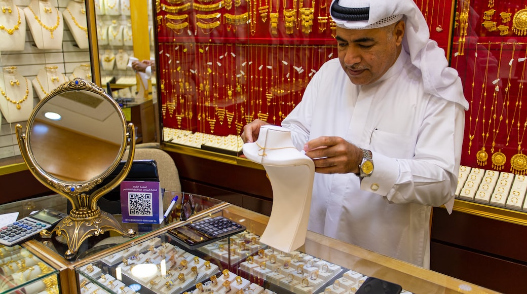 Gold Souq showing shopping and interior views as well as an individual male