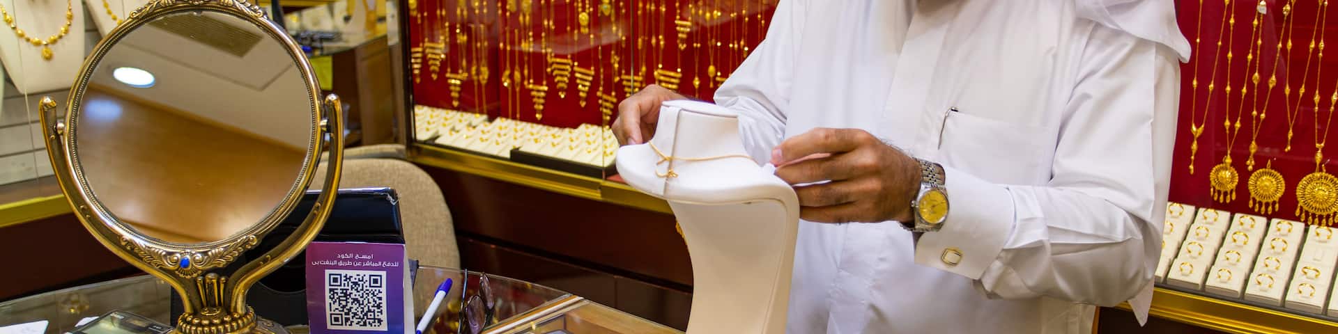 Gold Souq showing shopping and interior views as well as an individual male