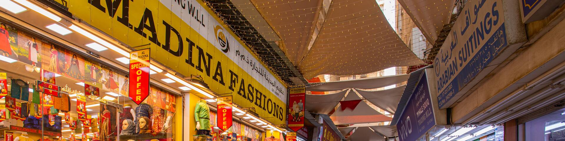 Bab Al Bahrain which includes street scenes and markets
