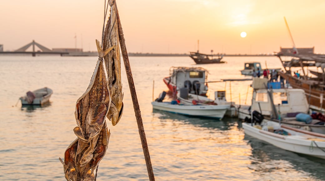 Manama showing a bay or harbor and a sunset