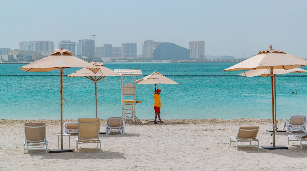 Muharraq showing a sandy beach, general coastal views and tropical scenes