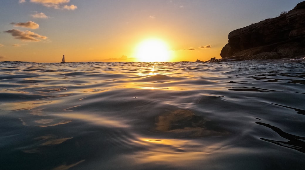 Cupecoy showing a sunset and general coastal views