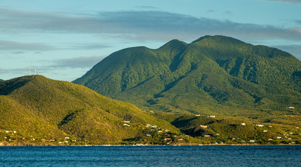 Cockleshell Bay which includes tranquil scenes, mountains and general coastal views