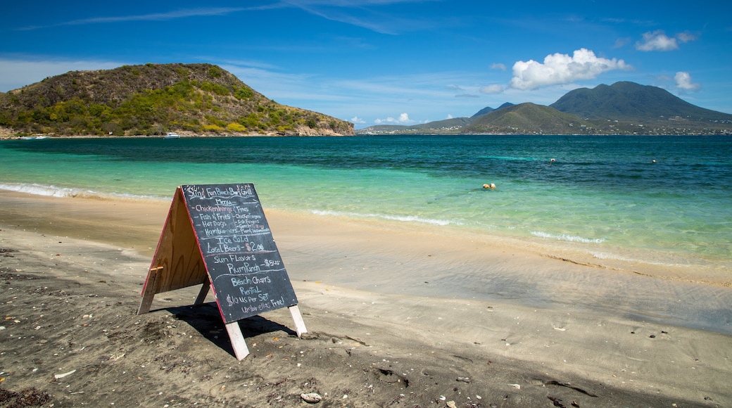 Cockleshell Bay which includes general coastal views and signage