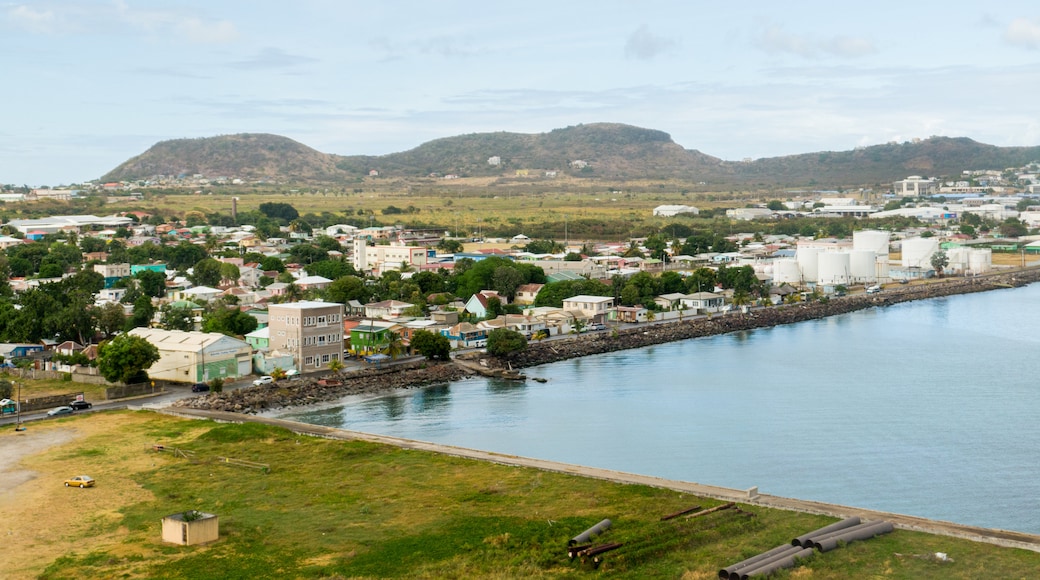 Frigate Bay which includes a bay or harbor, a coastal town and tranquil scenes