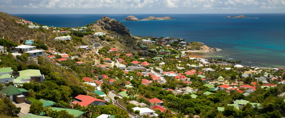 Anse des Cayes featuring landscape views, general coastal views and a coastal town