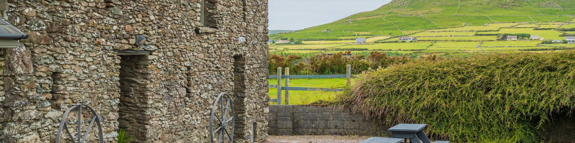Gallarus Oratory featuring tranquil scenes and heritage elements