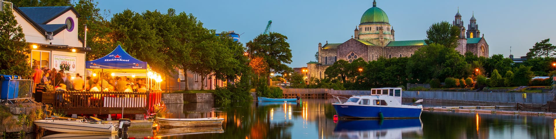 Galway City Centre which includes a bay or harbor and night scenes