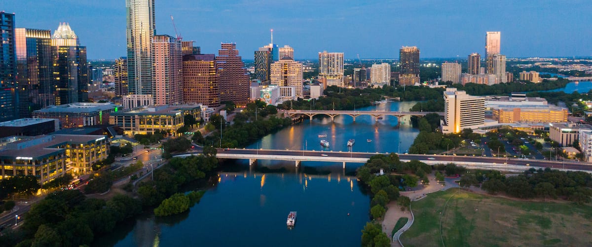 Downtown Austin showing night scenes, landscape views and a city