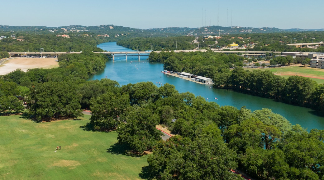 Zilker Park showing landscape views and a river or creek