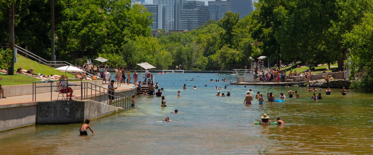 Barton Springs Pool which includes a river or creek and swimming