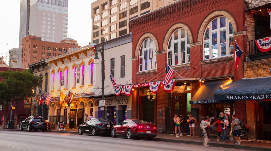 Sixth Street showing street scenes and a city