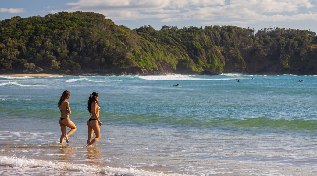 Little Diggers Beach showing swimming and general coastal views as well as a couple