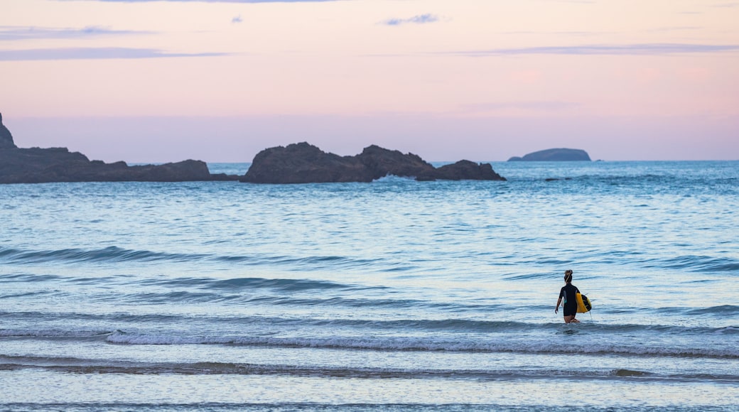 Little Diggers Beach which includes a sunset, surfing and general coastal views