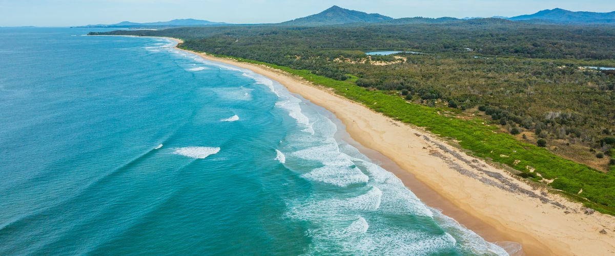 Urunga which includes landscape views, general coastal views and a sandy beach