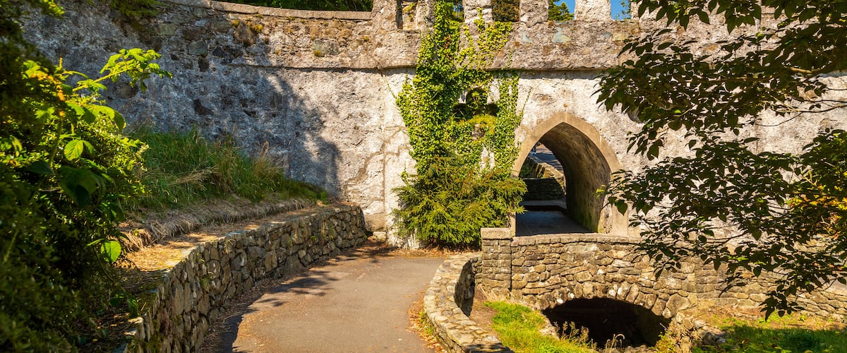 Tollymore Forest Park which includes heritage elements and chateau or palace