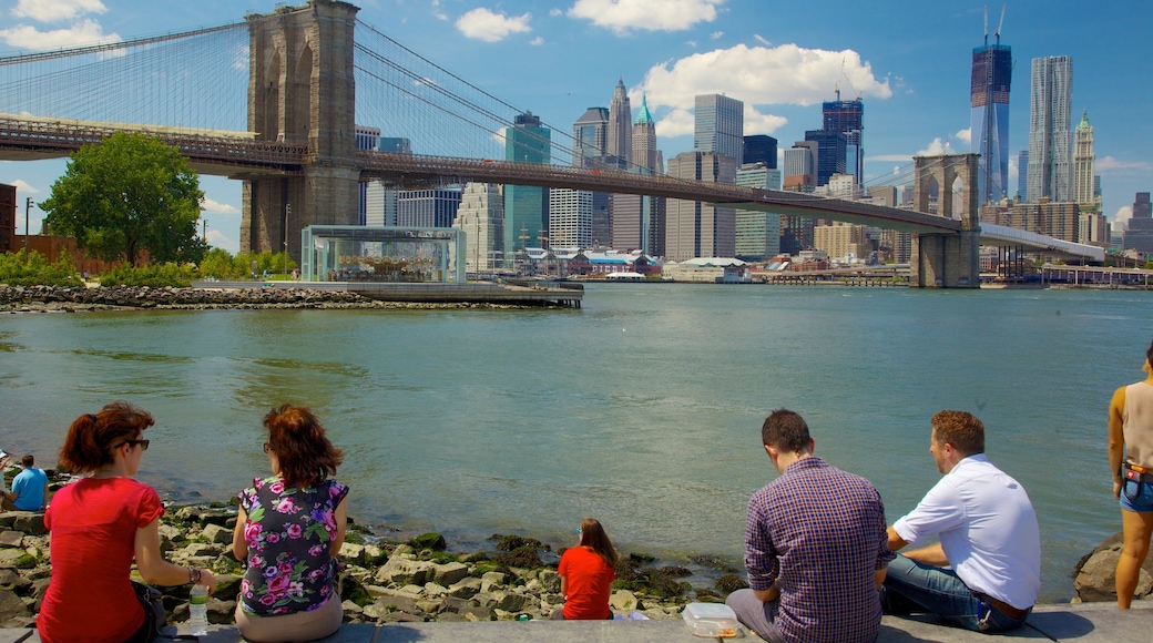 Brooklyn Bridge featuring a bridge, skyline and a river or creek