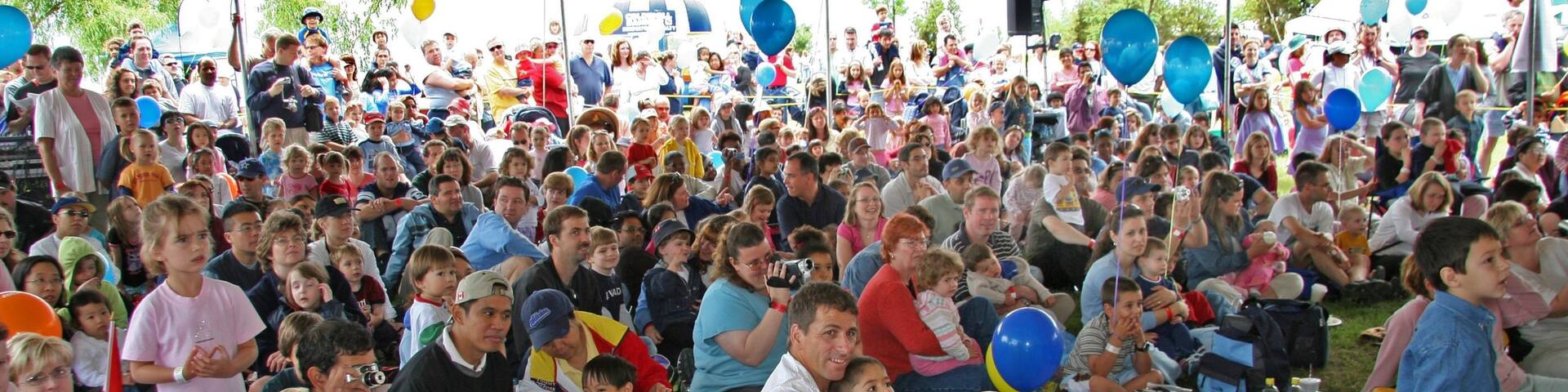 Toronto featuring a festival as well as a large group of people