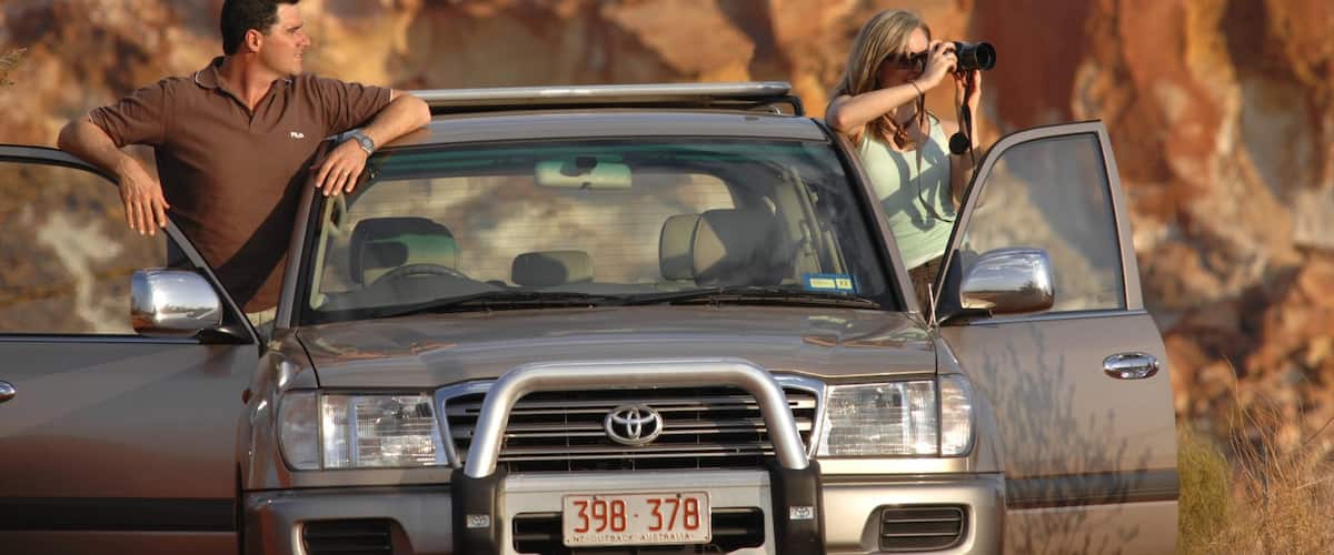 Alice Springs which includes touring and desert views as well as a couple