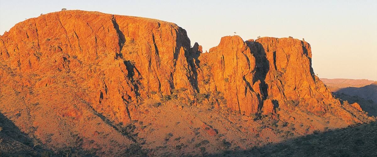 Alice Springs which includes a sunset and mountains