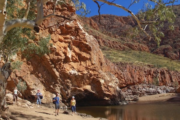 Alice Springs showing hiking or walking, a lake or waterhole and a gorge or canyon