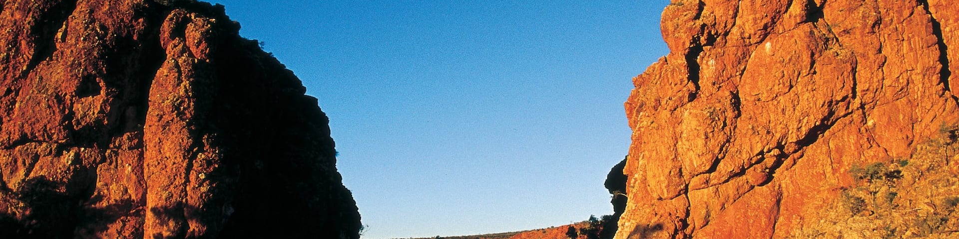Red Centre featuring a river or creek, a sunset and a gorge or canyon