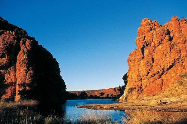 Red Centre featuring a river or creek, a sunset and a gorge or canyon