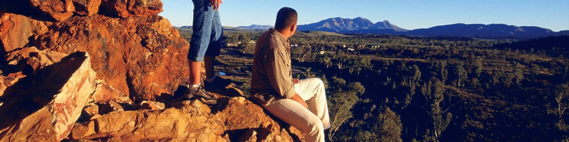 West MacDonnell National Park featuring a sunset, hiking or walking and landscape views