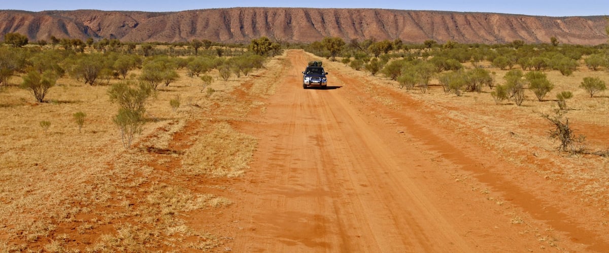 Red Centre featuring vehicle touring, desert views and a gorge or canyon